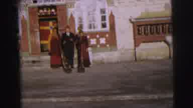 Calcutta India (1962): People Dressed Up Standing In Front Of A Building