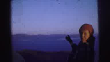 Calcutta India (1962): A Woman Pointing At A View Of Lake And Mountains