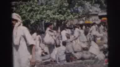 Calcutta India (1962): Indian People Of All Ages Wearing White Robes Walk Around