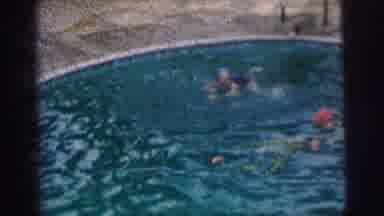 Calcutta India (1962): A Woman Wearing A Bathing Cap Swimming The Crawl Stroke In