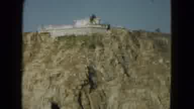 Acapulco Mexico (1962): A Massive Stone Building At The Top Of A Cliff Overlooks A