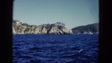 Acapulco Mexico (1962): Small Boat Cruising In Deep Blue Water By Steep Cliffs
