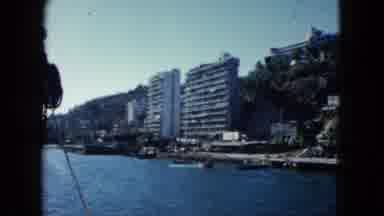 Acapulco Mexico (1962): People Swimming In A Lake Set Along A Highway With High