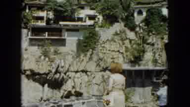 Acapulco Mexico (1962): People Standing In Front Of A Barrier Looking At Something