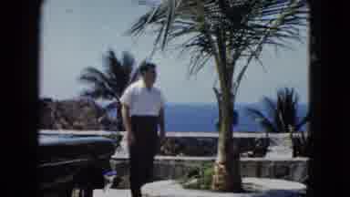 Acapulco Mexico (1962): Man Overlooking The Ocean Walks Toward The Camera
