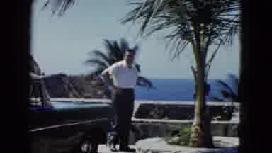 Acapulco Mexico (1962): Man Beside His Car Appreciates Nature In A High Standard