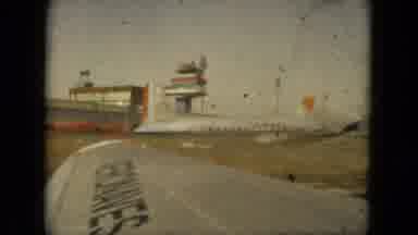 ACAPULCO MEXICO-1962: Airport Runway and Terminal with Propeller Airliner