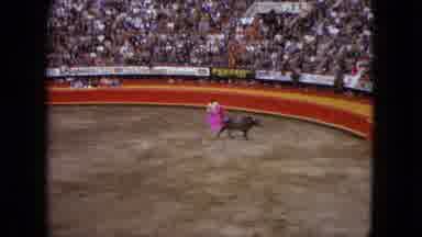 Acapulco Mexico (1962): A Matador Showing Off His Moves Teasing A Charging Bull