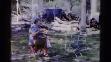 Wauconda Illinois USA (1961): The Grandmother Is Talking In The Garden Sitting In