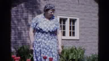 Wauconda Illinois USA (1961): The Girl Is Barking At The Dog And Is In A Red