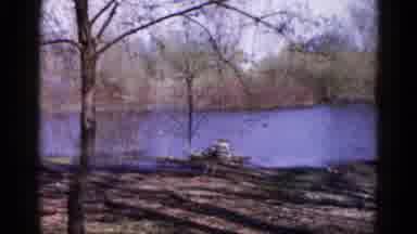 Wauconda Illinois USA (1961): There Is A Woman In Front Of A Lake Pointing At