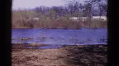 Wauconda Illinois USA (1961): River That Is Lazily Flowing Down The Banks Where A