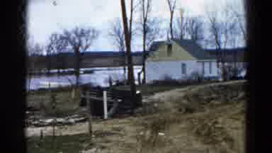 Wauconda Illinois USA (1961): Panning From Left To Right Is A House On The Side Of