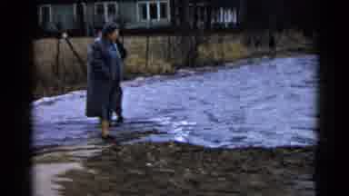 Wauconda Illinois USA (1961): Women In Long Coats Stand By The Water And Look Out