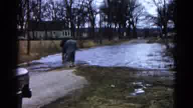 Wauconda Illinois USA (1961): A Couple Walking From A Parked Car To Look At Where
