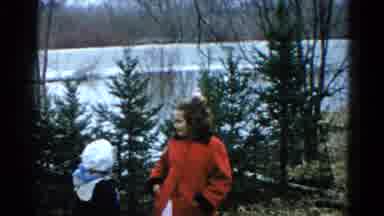 Wauconda Illinois USA (1961): Together They And The Children See The Water Coming