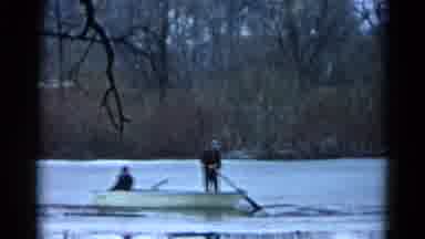 Wauconda Illinois USA (1961): Two People Rowing On A Boat In A Lake Surrounded By