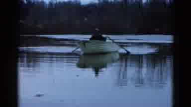 Wauconda Illinois USA (1961): Two People In A Small Boat Rowing Across The Water