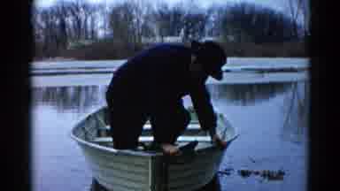 Wauconda Illinois USA (1961): Adult Male/Fisherman In His Boat Getting Ready To