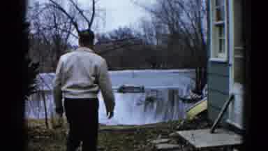 Wauconda Illinois USA (1961): Men Walking In Front Of House
