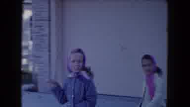 South Carolina USA (1961): Children Wearing Scarves And Walking In Driveway Waving