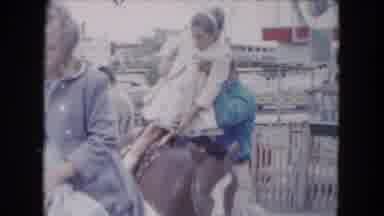 South Carolina USA (1961): Girls Getting Put On The Back Of A Horse Before Leaving