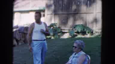 South Carolina USA (1961): Two Persons Are Talking In The Outside Of The Garden
