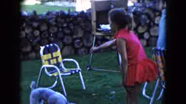 South Carolina USA (1961): Little Girl Reaching Out And Giving Tasty Treats To