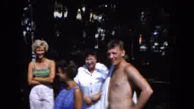 South Carolina USA (1961): Four People Standing On The Shore And Three People