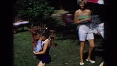 South Carolina USA (1961): The Little Was Carry The Dog On Her Hand And Her