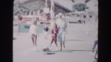 South Carolina USA-1961: Woman and Children Walking with Dog on Street
