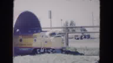 South Carolina USA (1961): A Kid-Sized Train With A Conductor And Two Passengers