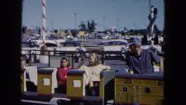 South Carolina USA (1961): Children Waving While Riding On A Small Locomotive