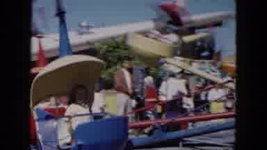 South Carolina USA (1961): Amusement Park With Tilt A Whirl Rides Give Smiling
