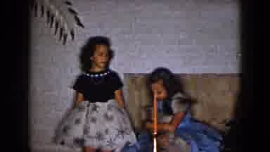 South Carolina USA (1961): Girl In Blue Party Dress Hands Struggling Small Dog To