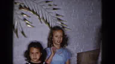 South Carolina USA (1961): Three People Stand In Front Of A Gold Wall Decoration