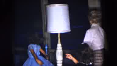 South Carolina USA (1961): 2 Girls Walk With Mom To Sit On Couch