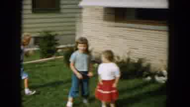 South Carolina USA (1961): A Mother Standing In The Front Of Her House Pointing At