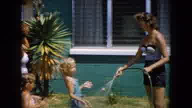 South Carolina USA (1961): Funny Outside Family Shower In Sun