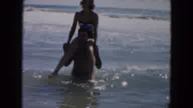 South Carolina USA (1961): Man Carries Woman On Shoulders And Teases About