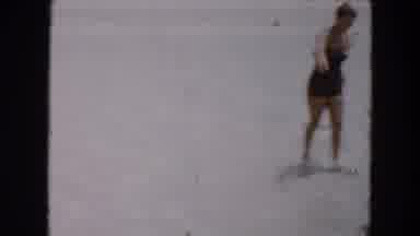 South Carolina USA (1961): Two Women In 1940 Era Swimsuits Chasing After A Young
