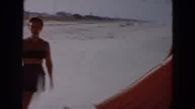 South Carolina USA (1961): People Playing On The Beach With Child Bouncing Ball
