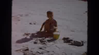 South Carolina USA (1961): Happy Kids In The Sand Playing With Their Toys As Their