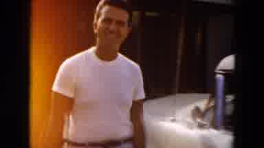 South Carolina USA (1961): Home Movie Man Putting Suitcase In Trunk Of Classic Car