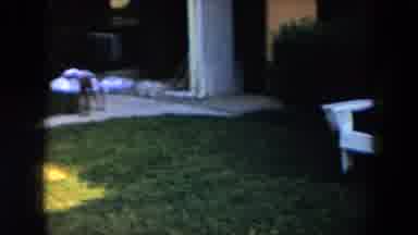 South Carolina USA (1961): A White Bench Sitting In View As Two Children Walk In