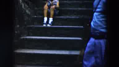 South Carolina USA (1961): A Woman Walking Down And A Child Sitting On Stone