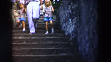 South Carolina USA (1961): The Lower Half Of Person And Two Small Children Walk