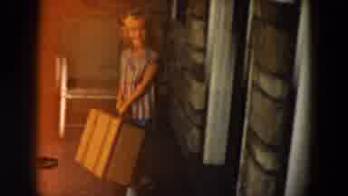 South Carolina USA (1961): A Cute Little Blonde Girl Carrying A Big Yellow