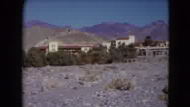 Nevada USA (1961): Mountain Buildings Hot Weather Blue Sky Many Stones Old Movie