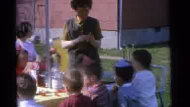 Camden New Jersey USA (1961): All Those Kids Play Together And He Is The Parent